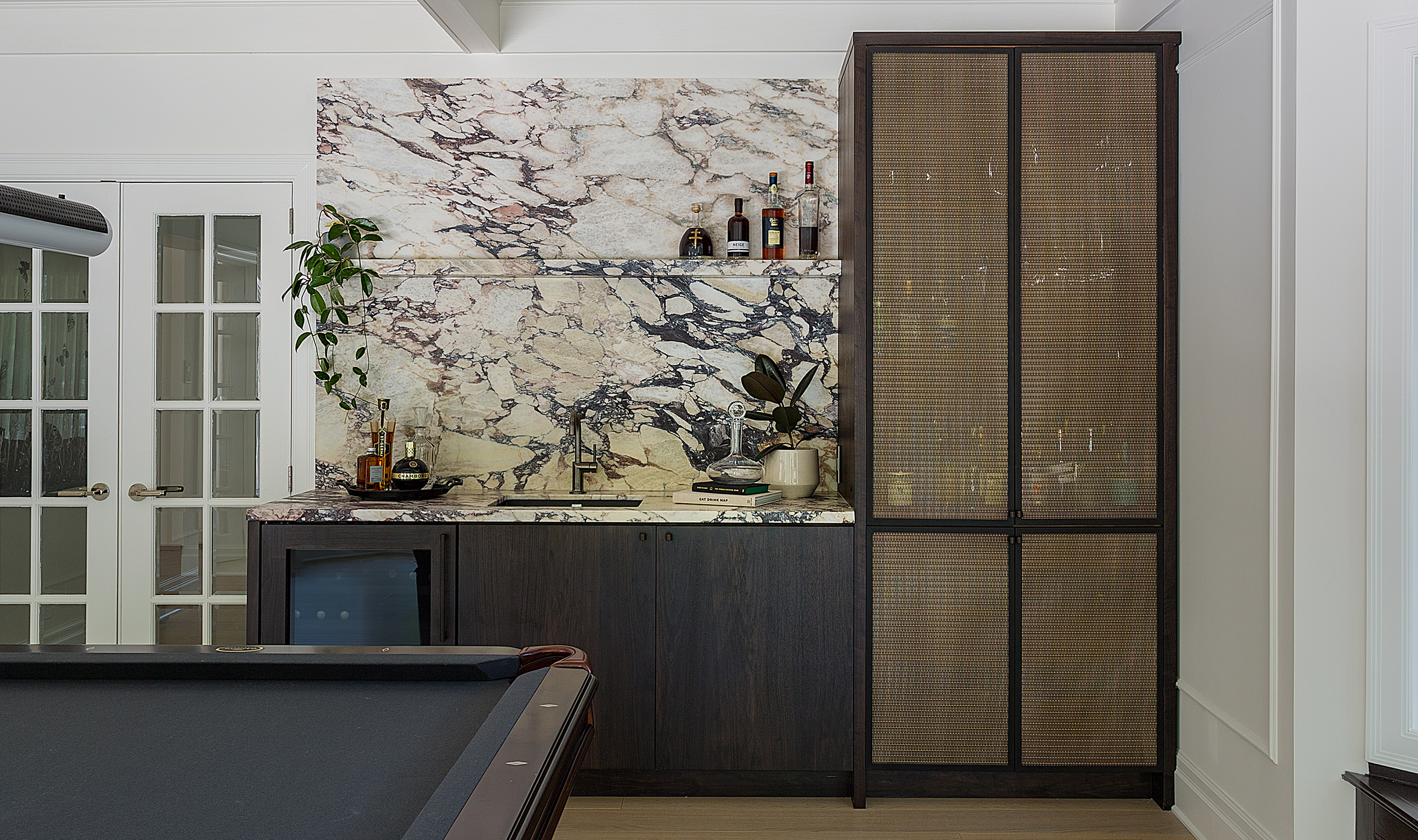 SPZ-52 woven wire mesh in an antique brass plated finish installed as cabinetry doors