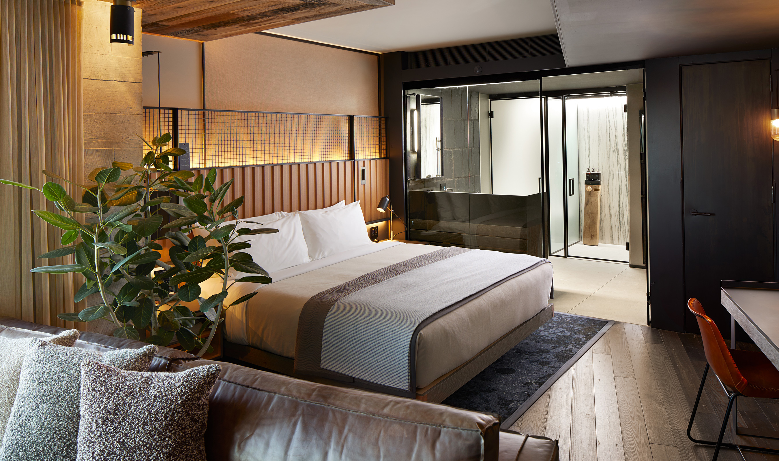 The industrial nature of L-85 wire mesh plays well with the natural design elements of the rooms.