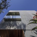 The S-9 wire mesh screen provides significant shading for the Southwest facade.