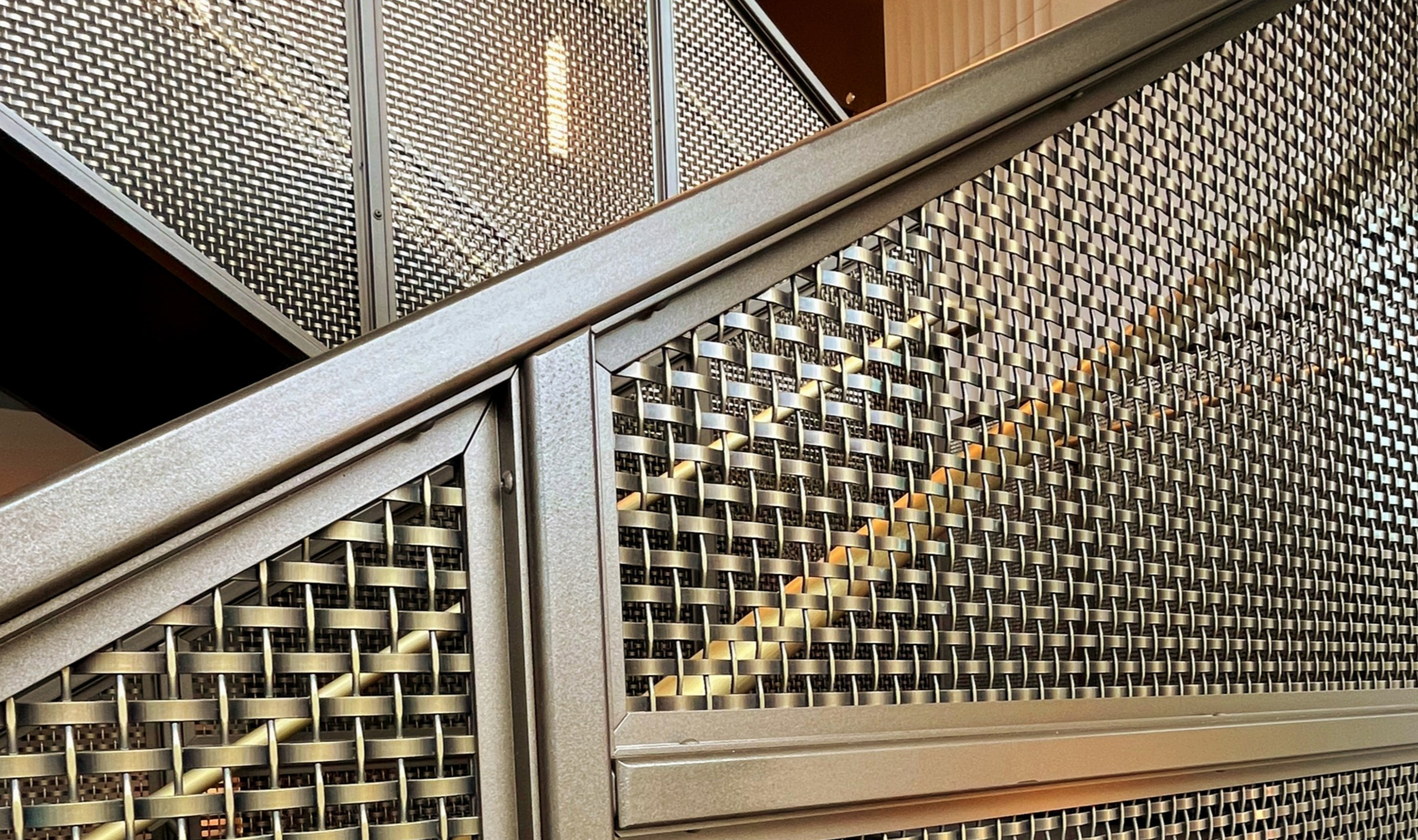 SZ-14 Woven Wire Mesh in Plated Antique Brass as Handrail Infill Panel SZ-14 Woven Wire Mesh in Plated Antique Brass as Handrail Infill Panel