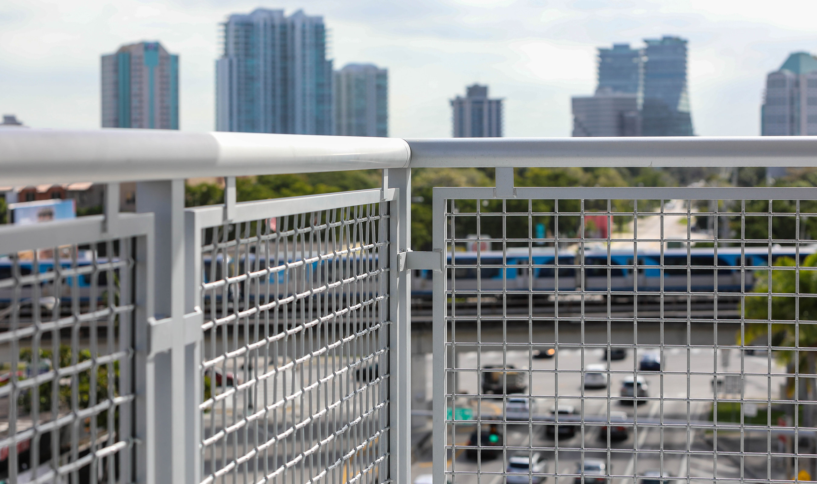 Banker Wire's L-64 woven wire mesh in powder coated aluminum is a perfect combination for dealing with the Florida coastline's corrosive nature. Banker Wire's L-64 woven wire mesh in powder coated aluminum is a perfect combination for dealing with the Florida coastline's corrosive nature.
