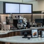 Inviting Coffee Bar featuring the Banker TXZ-3 Architectural Wire Mesh in Plated Antique Brass