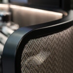 TXZ-3 Architectural Wire Mesh in Plated Antique Brass acting as a semi-transparent space divider