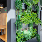 Banker Welded Wire Mesh Trellis provides clean lines behind the Indoor Planter
