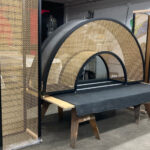 Curved bronze mesh archway designed and fabricated by Desposito Designs for the Ace Porter bar in the Omni San Diego