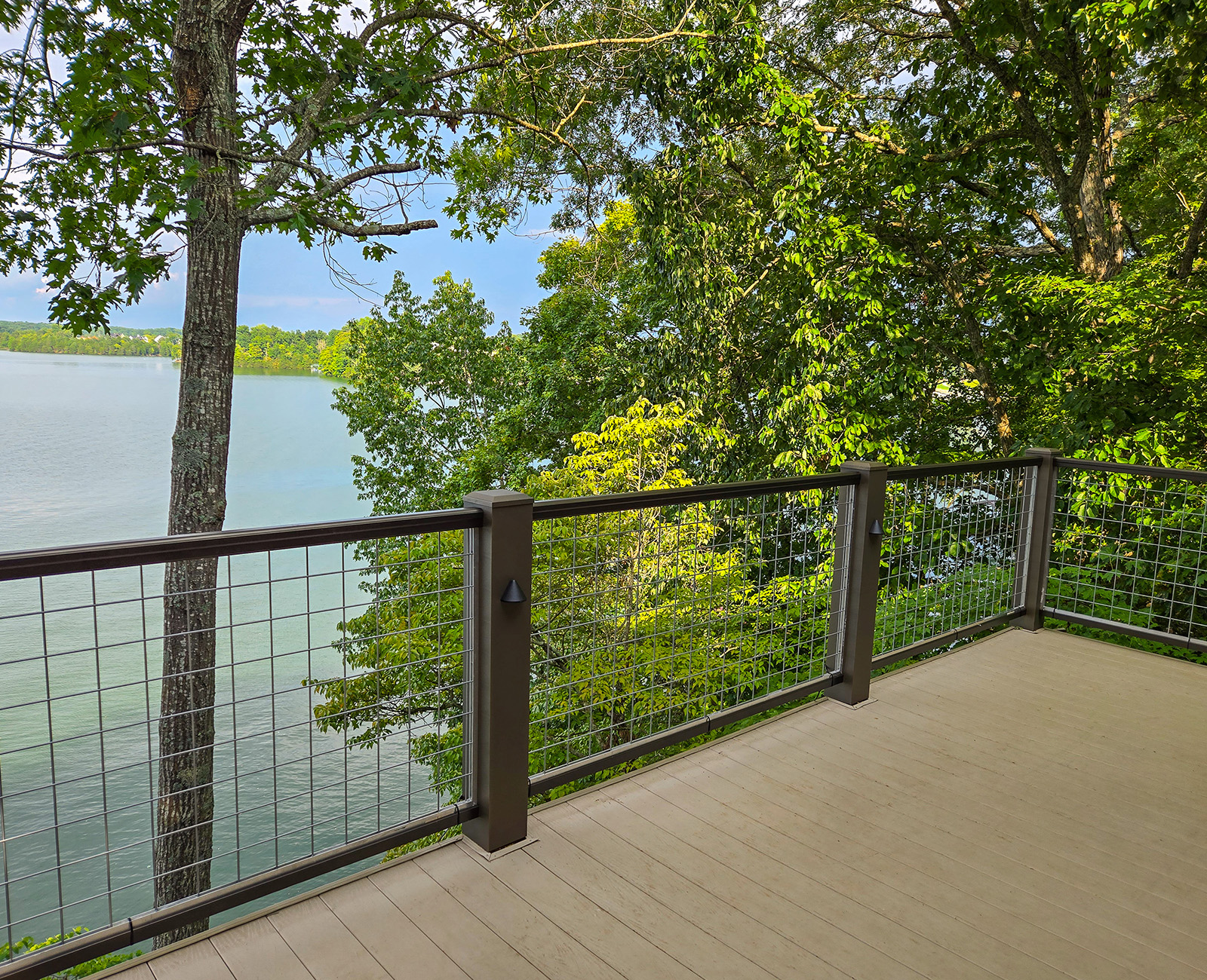 Close-up of welded wire mesh deck railing with industrial design, perfect for DIY outdoor projects and low-maintenance living.