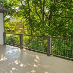 Modern outdoor railing featuring Banker Wire welded wire mesh, designed for weather resistance and homeowner-friendly upgrades.