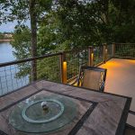 Residential deck railing featuring Banker Wire welded wire mesh, offering a sleek and secure outdoor solution for DIY homeowners.