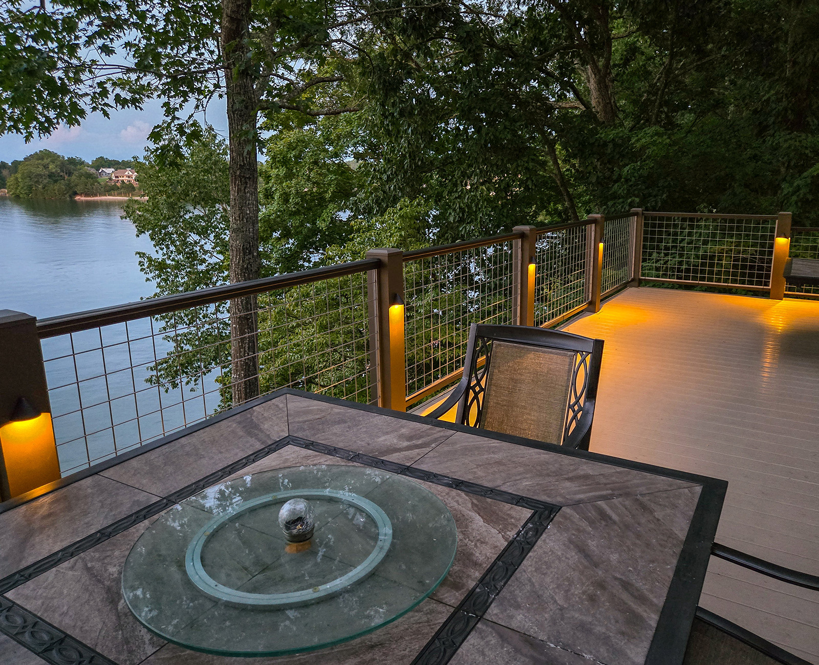 Residential deck railing featuring Banker Wire welded wire mesh, offering a sleek and secure outdoor solution for DIY homeowners.