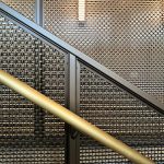 Discover how woven wire mesh transforms stairwells into architectural statements. This New York project combines strength, transparency, and luxury finishes for a modern, high-end interior design solution.