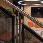 Banker LPZ-71 architectural wire mesh enhances staircase design with clean lines, durable materials, & a contemporary look ideal for residential & commercial spaces.