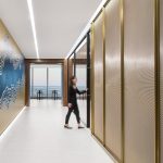 Decorative woven wire mesh IPZ-25 installed in corporate interior design as a space divider.