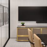 Decorative woven wire mesh installed in corporate interior design as cabinet infill panels