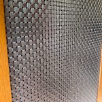 Featuring M33-2 architectural woven wire mesh, this home bar remodel blends contemporary design with rich texture and visual screening for a refined, upscale aesthetic.