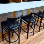 Featuring M33-2 architectural woven wire mesh, this home bar remodel blends contemporary design with rich texture and visual screening for a refined, upscale aesthetic.